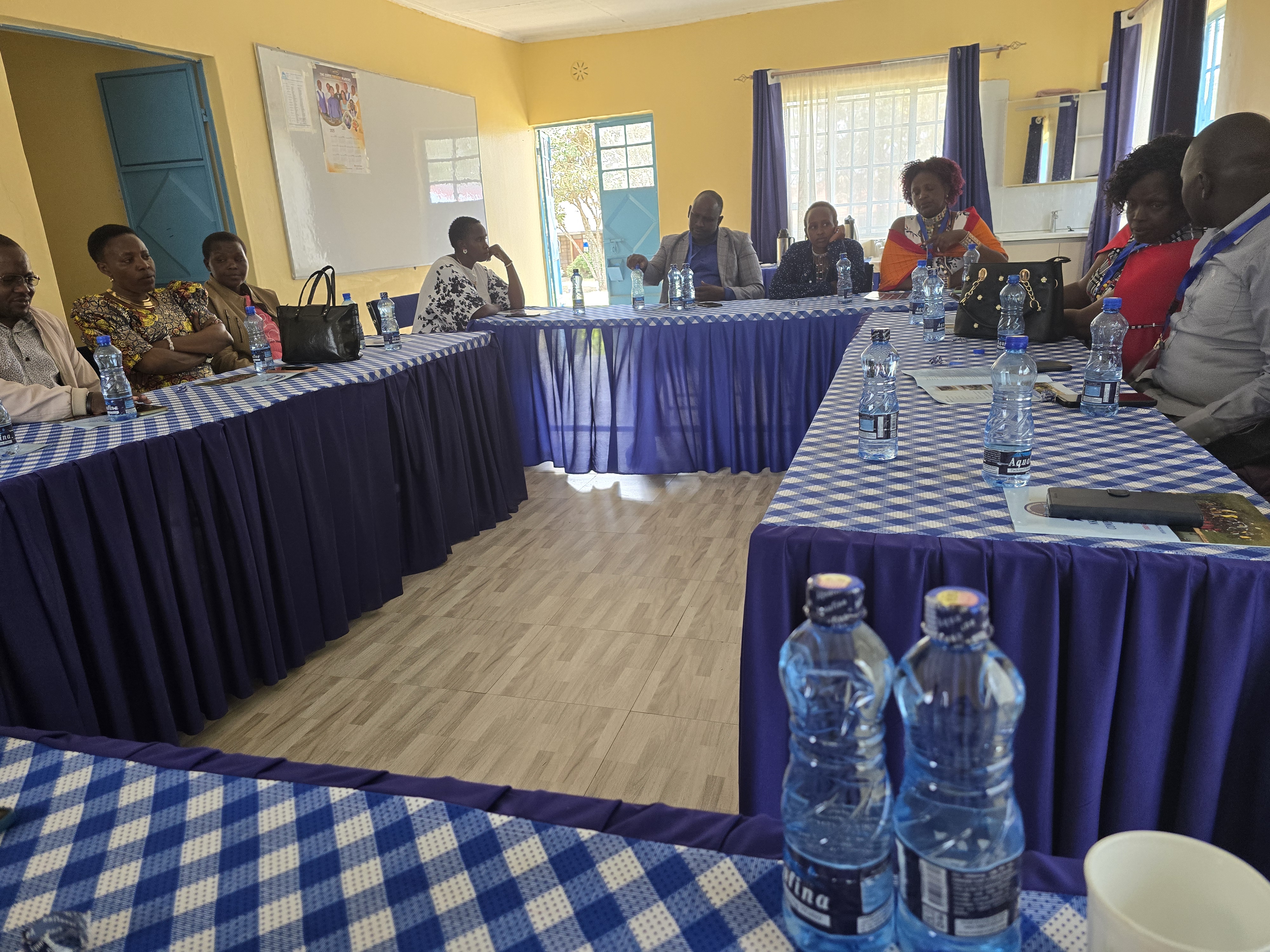 MEMBERS OF THE BOARD DELIBERARITING ABOUT THE SCHOOL.
