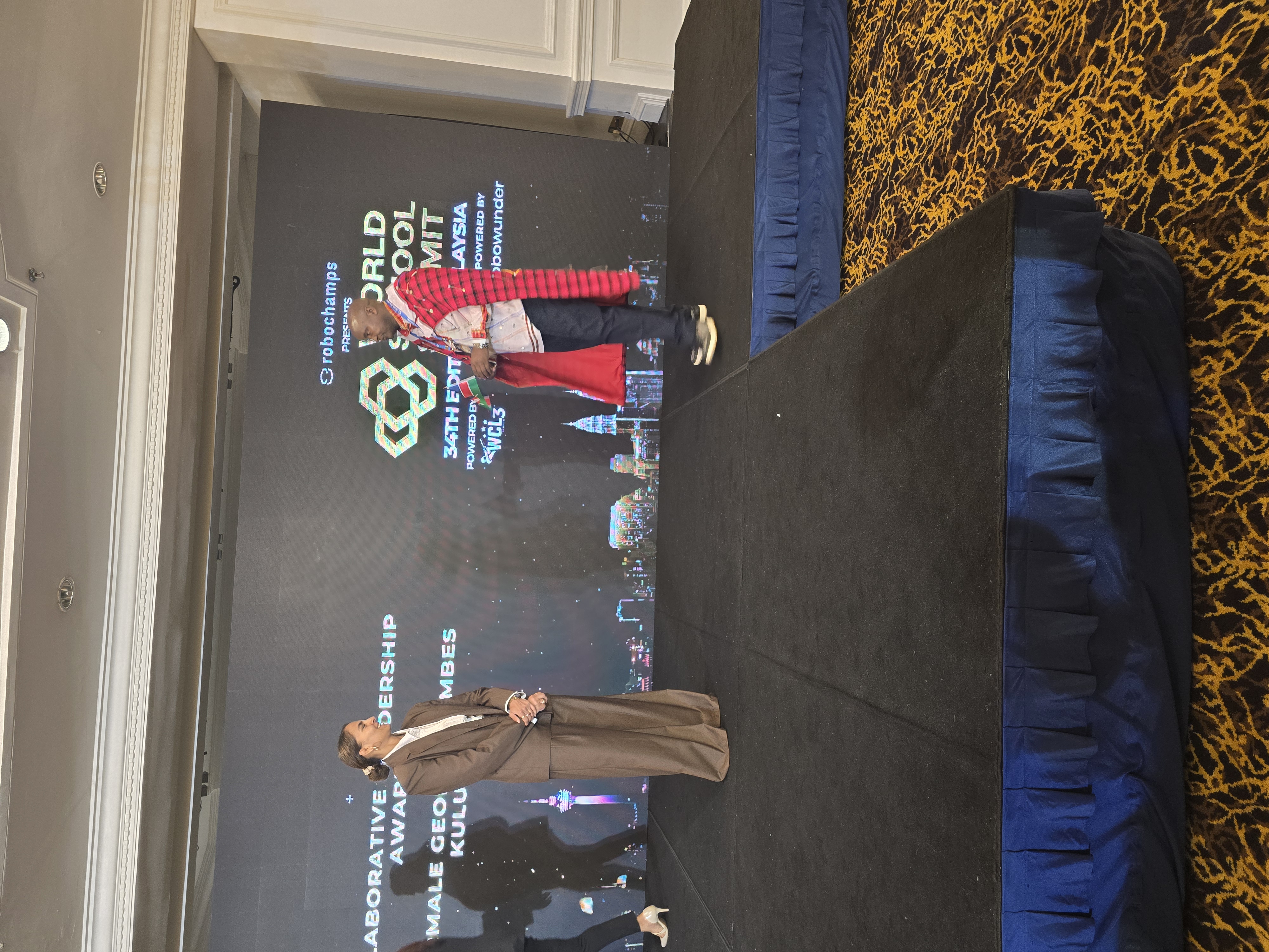 THE PRINCIPAL ATTENDING WORLD SCHOOL SUMMIT IN MALAYSIA.